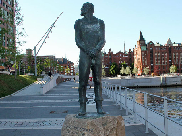 Statue man rock water city free wallpaper - medium preview image