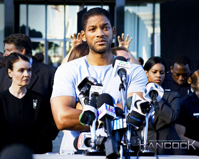 Man microphones crowd hands up free wallpaper - medium preview image