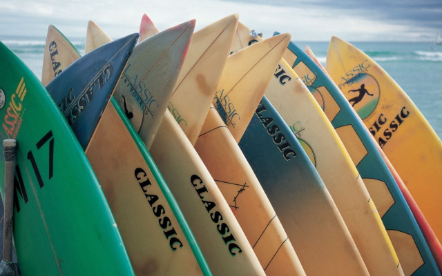 Surfboards beach ocean cloudy sky free wallpaper - medium preview image