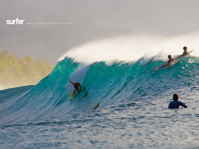 Three surfers riding large wave free wallpaper - medium preview image