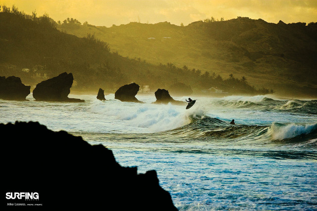 Surfing wave ocean rocky shore free wallpaper - medium preview image