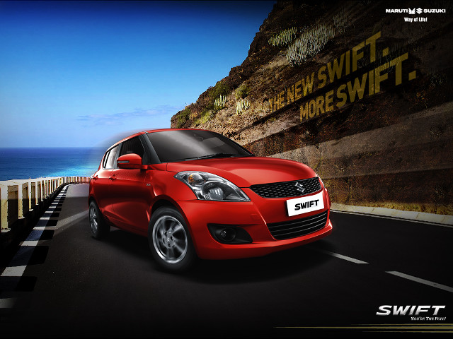 Red car driving cliff side free wallpaper - medium preview image