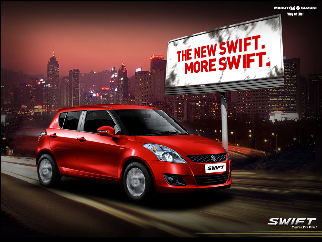 Red car driving street billboard free wallpaper for desktop - medium preview image