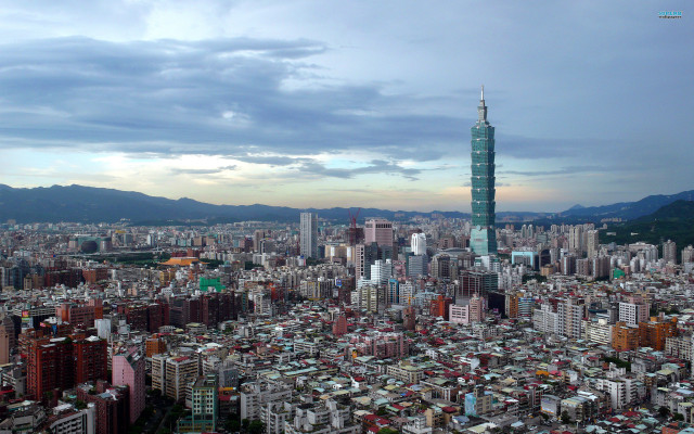 City skyline tall buildings mountains free wallpaper - medium preview image