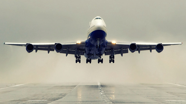Large jetliner cloudy sky runway free wallpaper - medium preview image