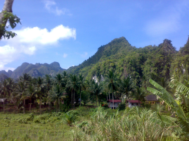 Lush green hillside house mountain free wallpaper - medium preview image