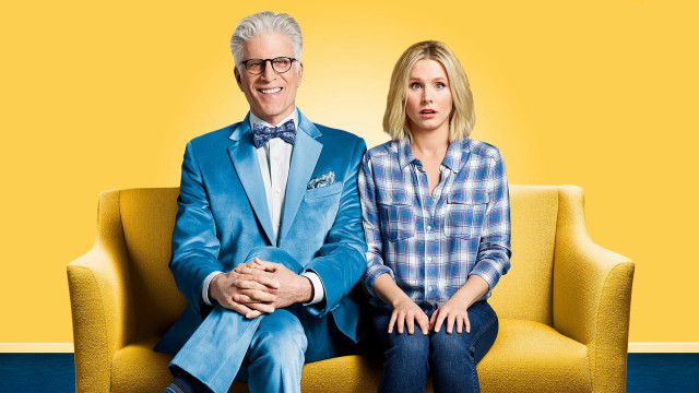 Man woman couch yellow wall free wallpaper - medium preview image