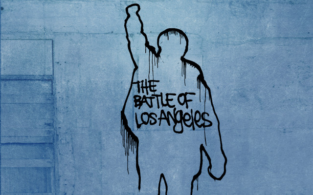 Man holding skateboard battle of free wallpaper - medium preview image