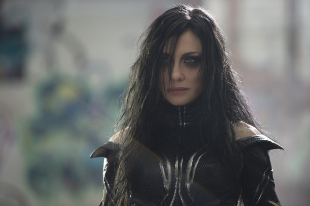 Woman black leather horns outfit free wallpaper - medium preview image
