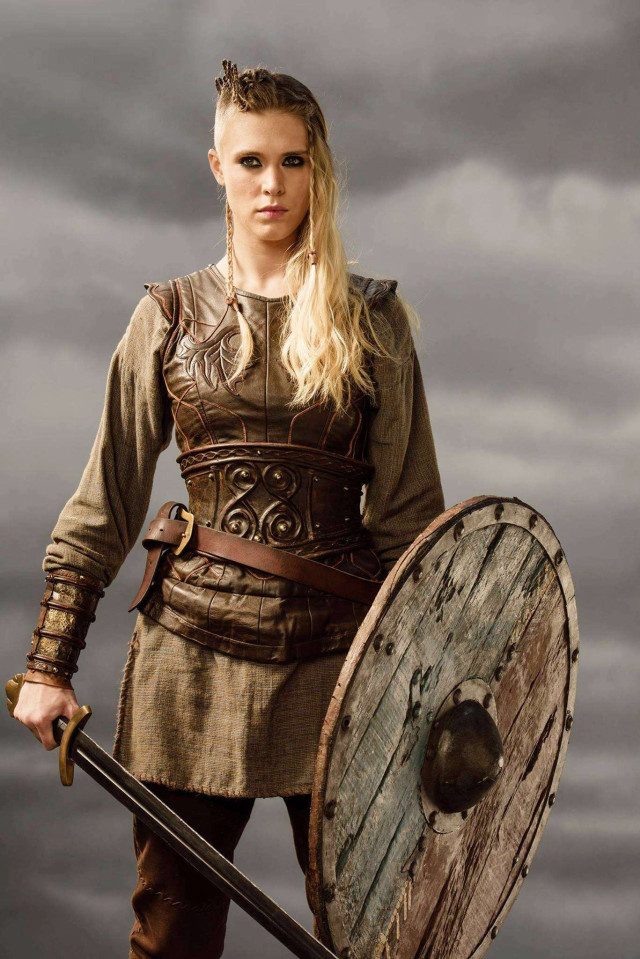 Woman brown outfit sword shield free wallpaper - medium preview image