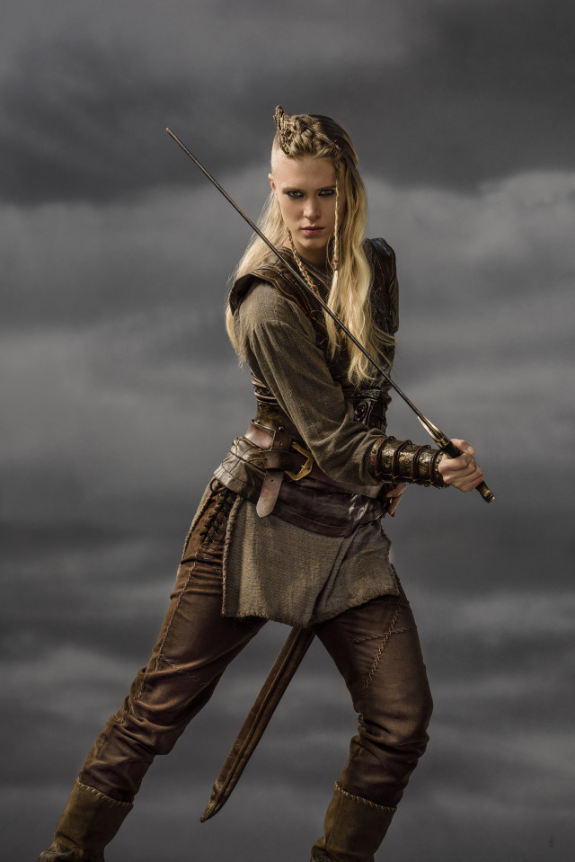 Woman costume sword cloudy dark free wallpaper - medium preview image