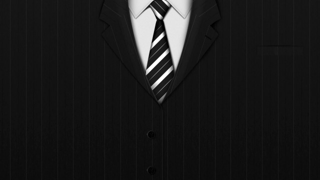 Sharp man in suit black free wallpaper - medium preview image