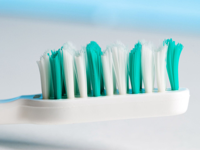 Toothbrush toothpaste tabletop blue white free wallpaper - medium preview image