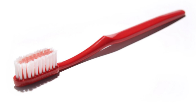 Red toothbrush white bristles white free wallpaper - medium preview image