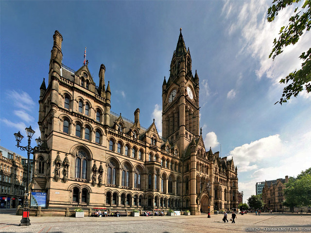 Large building clock tower sidewalk free wallpaper - medium preview image