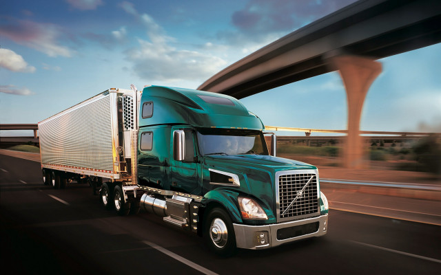 Green semi truck highway bridge #2 free wallpaper - medium preview image
