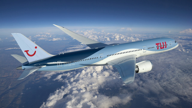 Jetliner flying blue sky clouds #7 free wallpaper - medium preview image