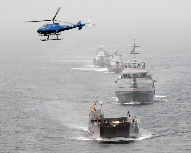 Helicopter flying fleet ships ocean free wallpaper - medium preview image