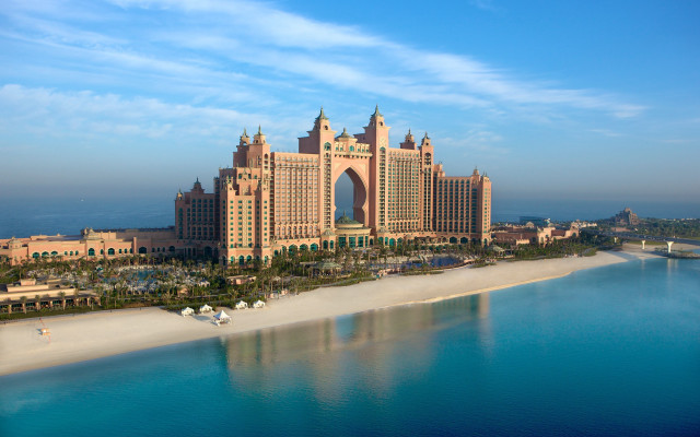 Large building tower beach ocean free wallpaper - medium preview image