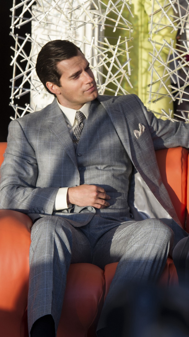Man suit chair hands pockets free wallpaper - medium preview image