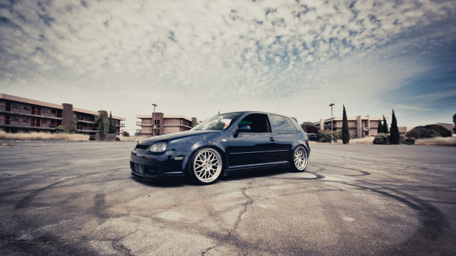 Black car parking lot building #6 free wallpaper for desktop - medium preview image