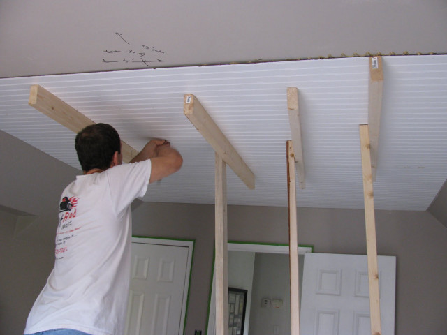 Man working ceiling house unfinished free wallpaper - medium preview image