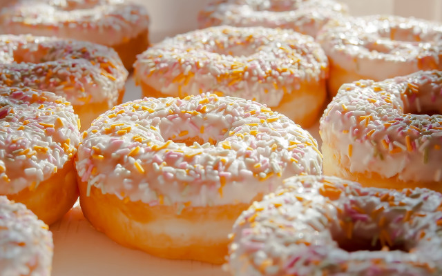 Glazed donuts sprinkles bite taken free wallpaper - medium preview image