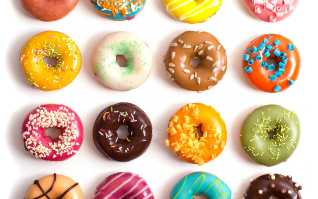 Dozen donuts arranged row white free wallpaper - medium preview image