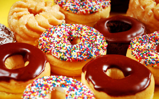 Doughnuts sprinkles chocolate frosting table free wallpaper - medium preview image