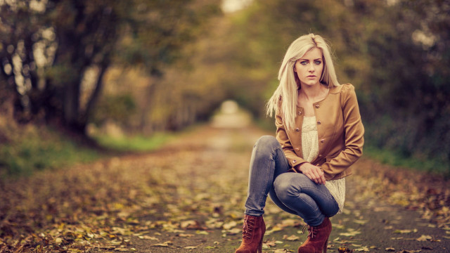 Woman sitting tree stump forest free wallpaper - medium preview image