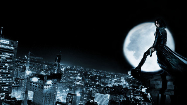 Man standing building full moon free wallpaper - medium preview image