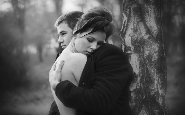 Couple hugging in the woods free wallpaper - medium preview image