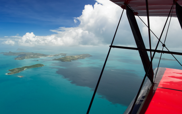 Tropical island plane window ocean free wallpaper - medium preview image
