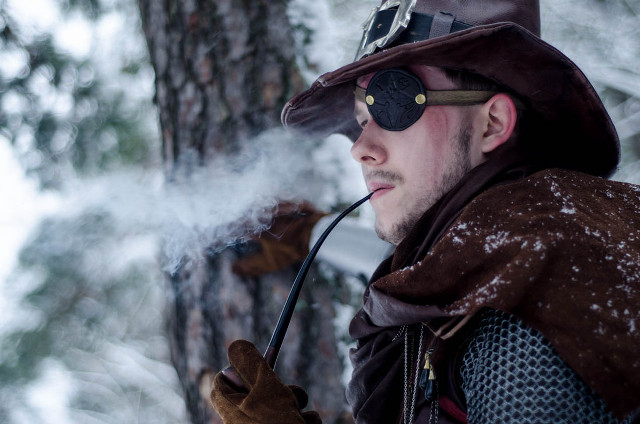 Man hat coat pipe snow free wallpaper - medium preview image