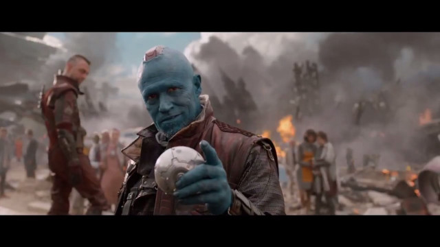 Man blue mask holding ball free wallpaper - medium preview image
