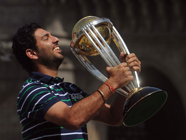 Man holding trophy smiling looking free wallpaper - medium preview image