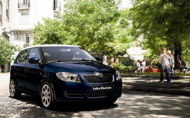 Blue car parked woman walking free wallpaper - medium preview image