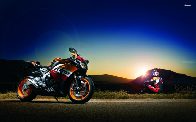 Motorcycle parked mountain range sunset free wallpaper - medium preview image
