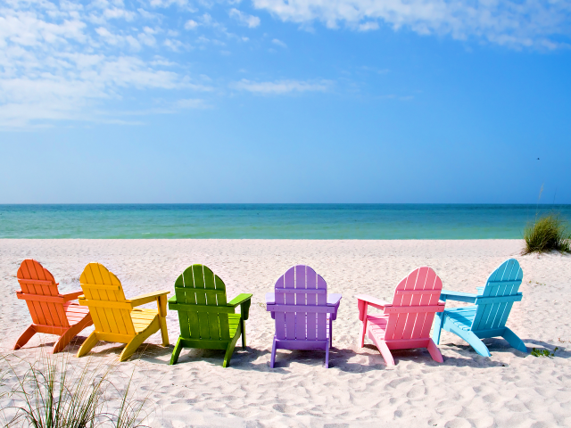 Colorful chairs sandy beach ocean free wallpaper - medium preview image