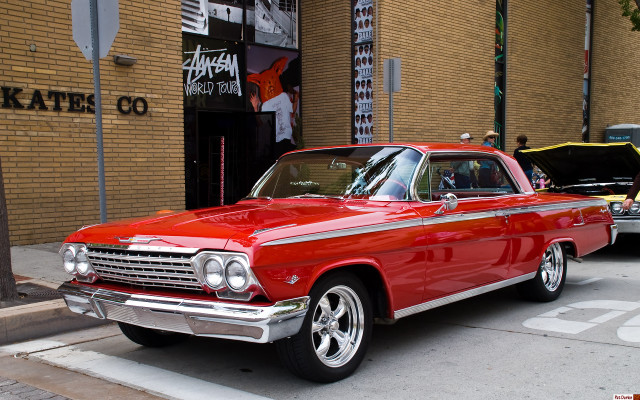Red car parked side road free wallpaper - medium preview image