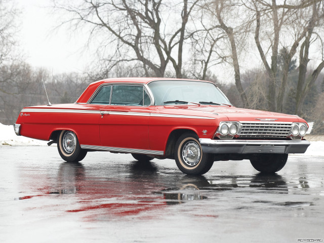 Red car snowy surface trees free wallpaper - medium preview image