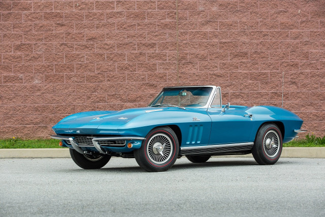 Blue corvette parked brick wall free wallpaper - medium preview image