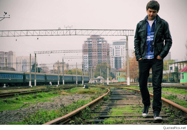 Man standing train track city #3 free wallpaper - medium preview image