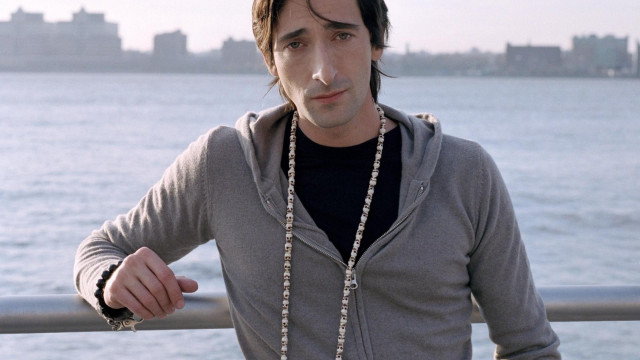 Man water necklace city background free wallpaper - medium preview image