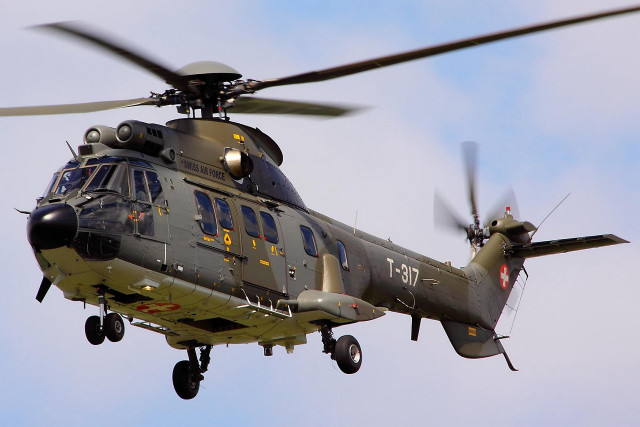 Helicopter flying cloudy blue sky #2 free wallpaper - medium preview image