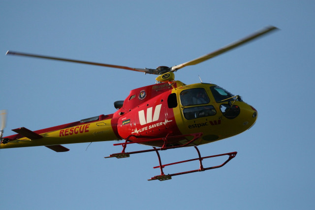 Red yellow helicopter blue sky #2 free wallpaper - medium preview image