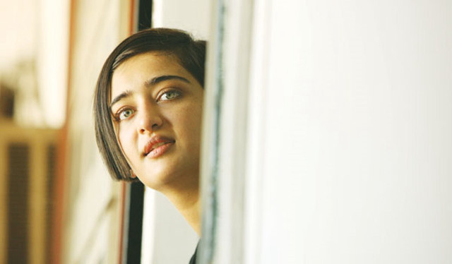 Woman looking out window empty free wallpaper - medium preview image
