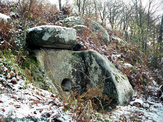 Large rock snow hillside trees free wallpaper - medium preview image