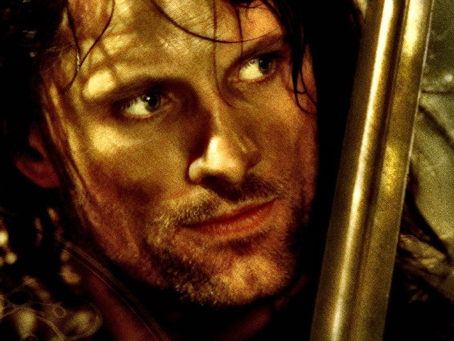 Man sword closeup looking camera free wallpaper - medium preview image