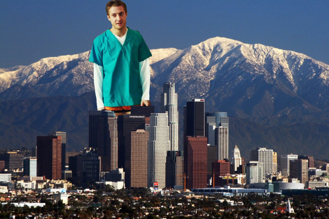 Man standing tall building city free wallpaper - medium preview image